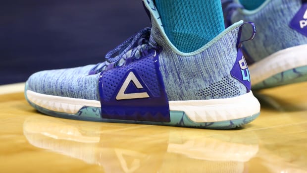 View of blue and green Peak shoes.